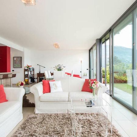 Parco San Andrea Elegante Villa Менаджо Екстериор снимка